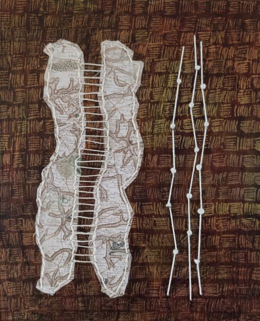 Carte brodée sur fond de traits cuivrés